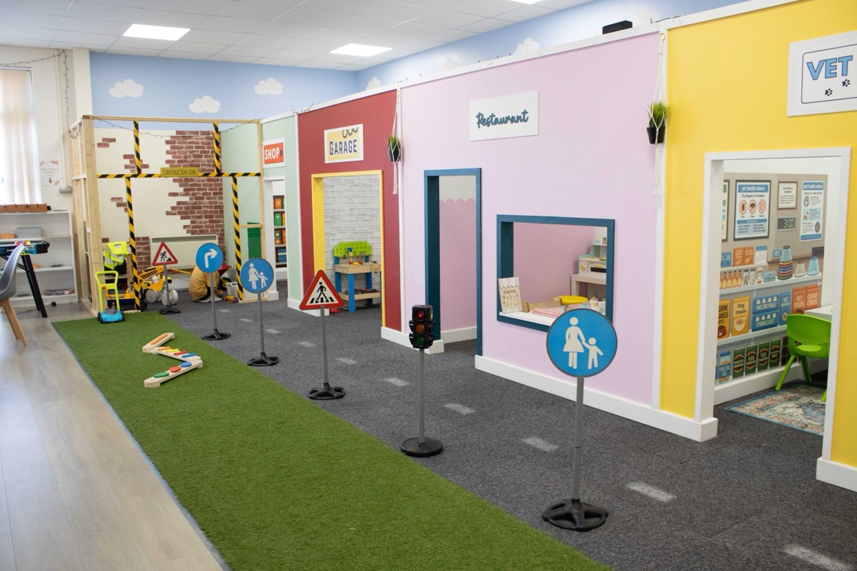 The role play supermarket stocked with wooden food